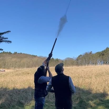 Clay shooting action at Elliott Clays — smoke from the barrel, Birkhill Castle Estate